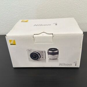 New Nikon J1 white camera with 10-30mm and 30-110mm lenses